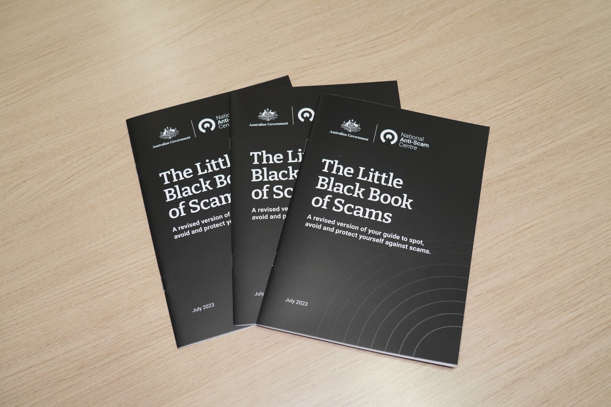 Request the 'Little Black Book of Scams' Main Image